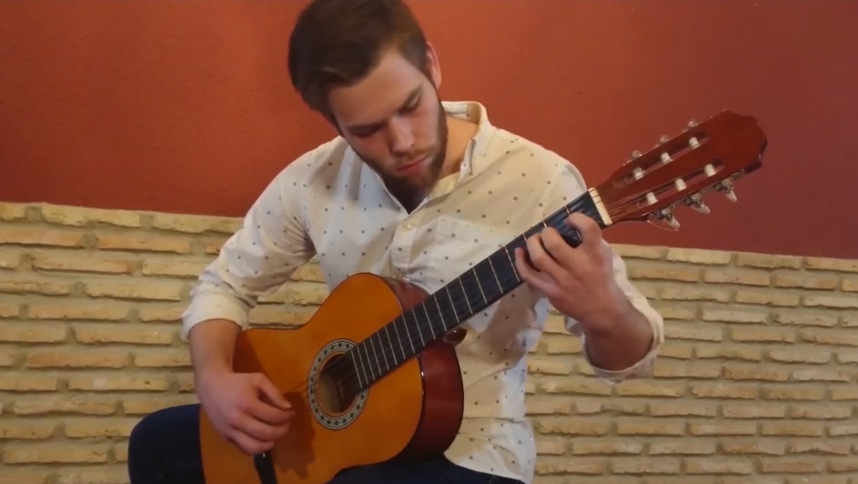 a guitar studies student performing