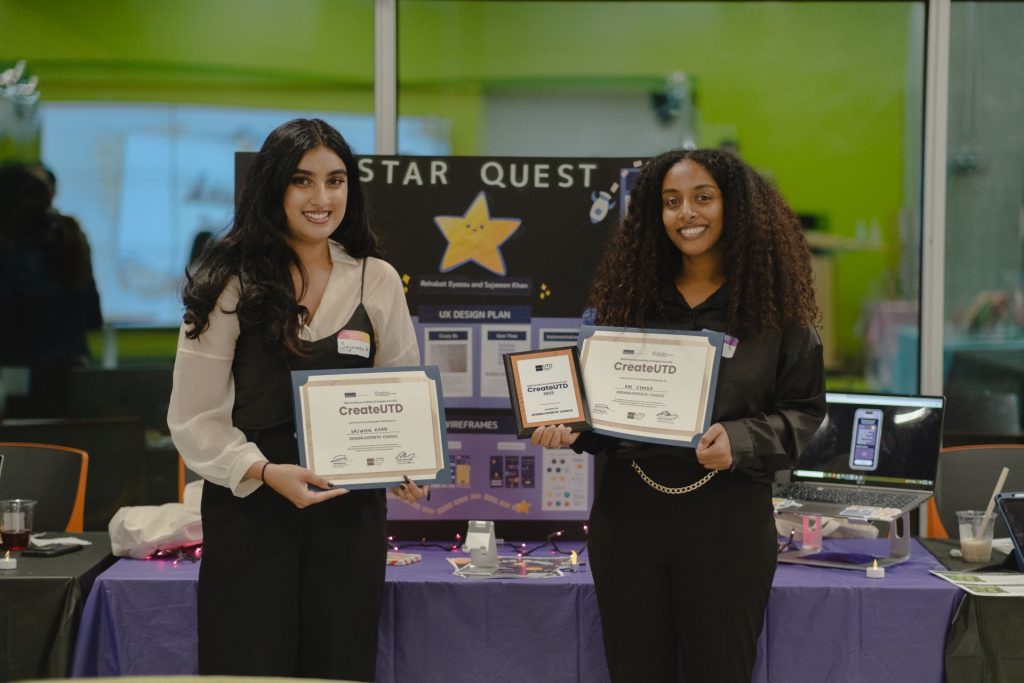 Posing with their Design Expert Award are Sajween Khan on the left and Rae Eyassu on the right, presenting their group project "Star Quest."