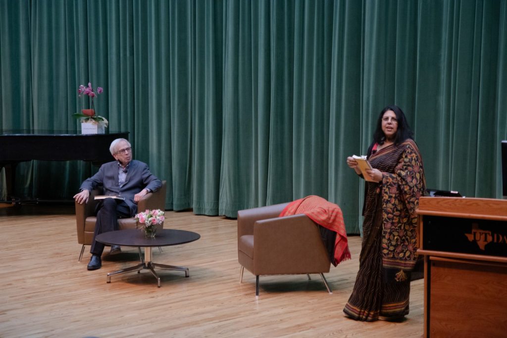Dr. Chitra Banerjee Divakaruni discusses India's independence with woman in sari and Dr. Dennis M. Kratz in suit sitting on the left at the Lecture on Asian Studies event.