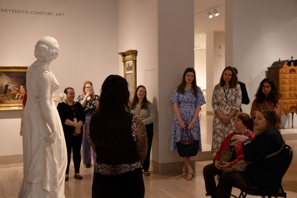 Sofia Penny discussing Anne Whitney's marble sculpture Lady Godiva at the Dallas Museum of Art on Feb. 23.