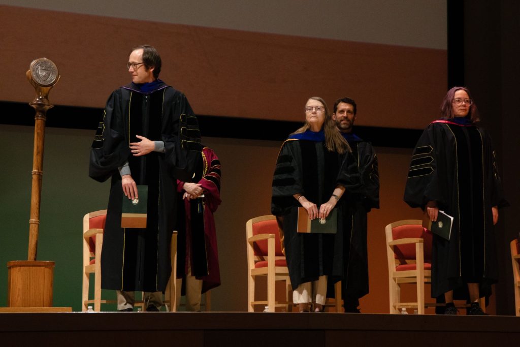 From left to right, Dr. Hanno Berger, Dr. Erika Doss, and Dr. Charissa N. Terranova recognized at investiture ceremony among eight UT Dallas investees.