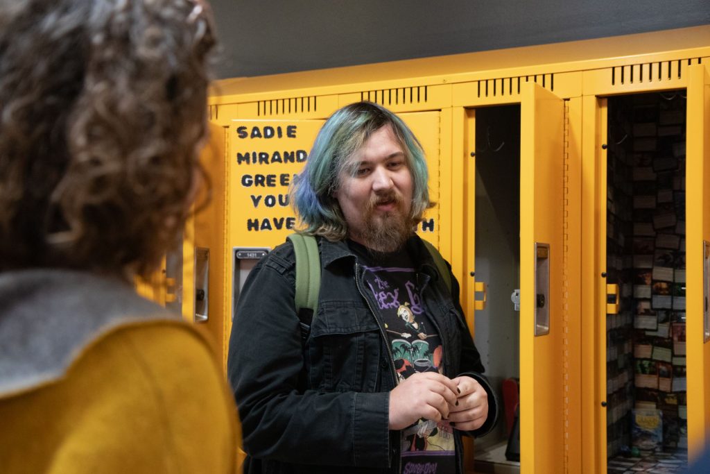 Spring semester unveiling: lockers displayed, contributors invited. Judges choose winner. Winners' lockers sealed in plexiglass for permanent exhibition.